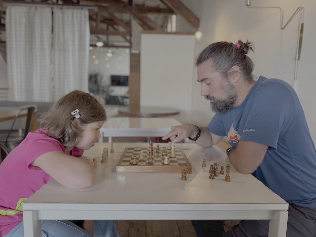 Chess lesson at Mac Market